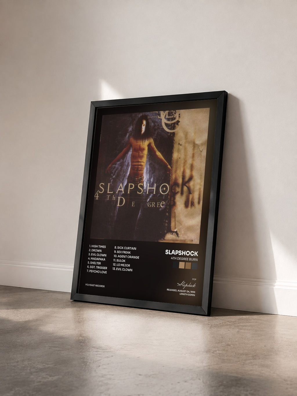 #noir Tableau de l'album 4th Degree Burn de Slapshock vu de trois quarts, cadre noir