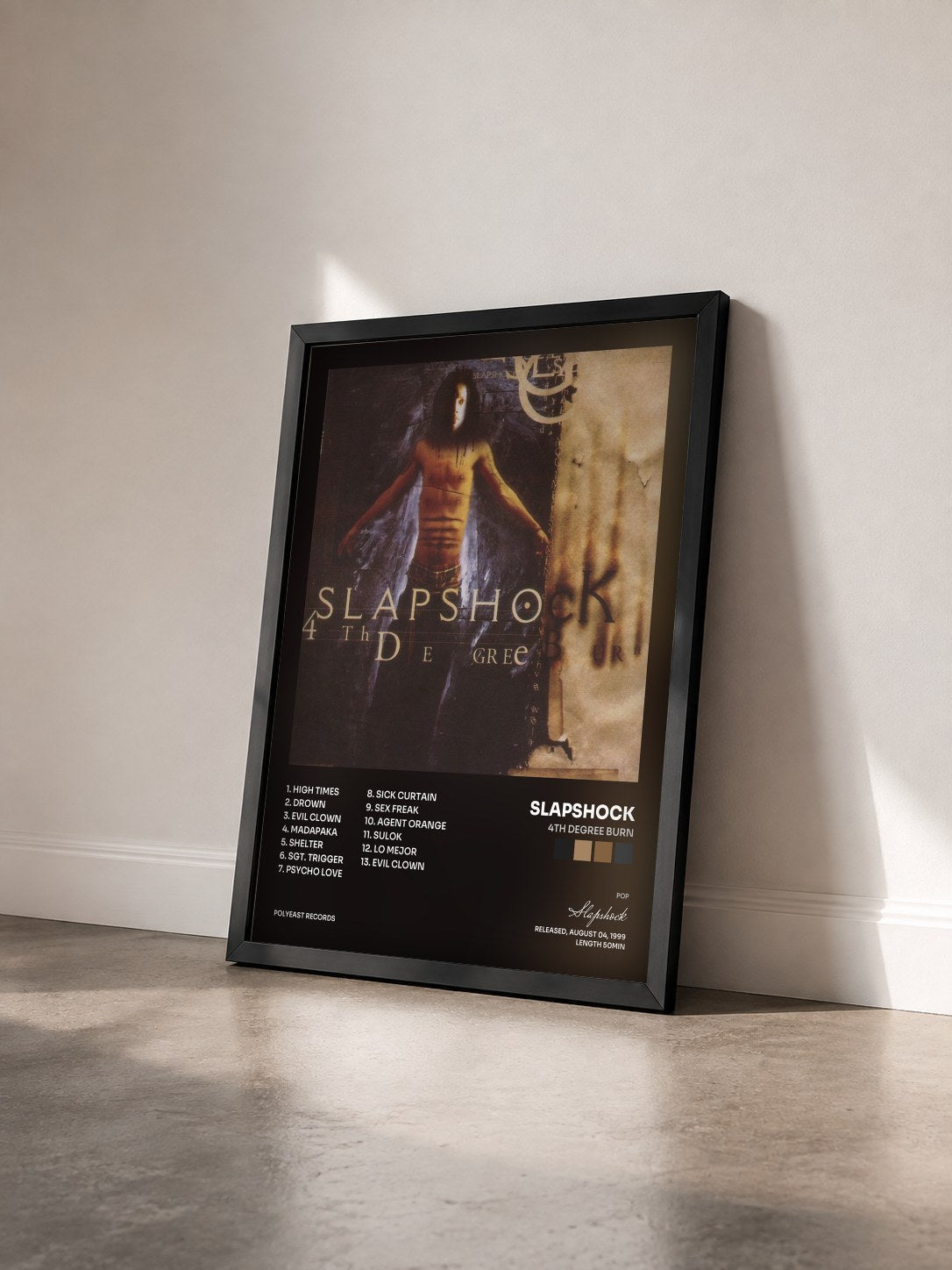 #noir Tableau de l'album 4th Degree Burn de Slapshock vu de trois quarts, cadre noir
