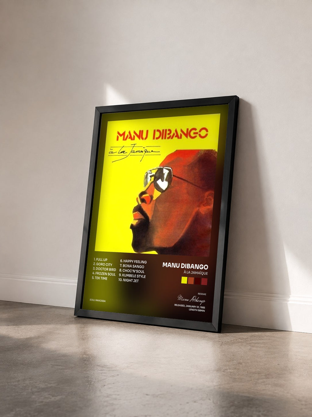 #noir Tableau de l'album À La Jamaïque de Manu Dibango vu de trois quarts, cadre noir