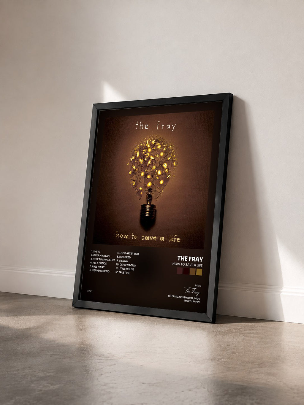 #noir Tableau de l'album How To Save A Life de The Fray vu de trois quarts, cadre noir