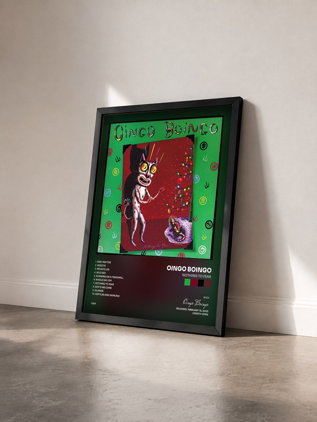 #noir Tableau de l'album Nothing To Fear de Oingo Boingo vu de trois quarts, cadre noir