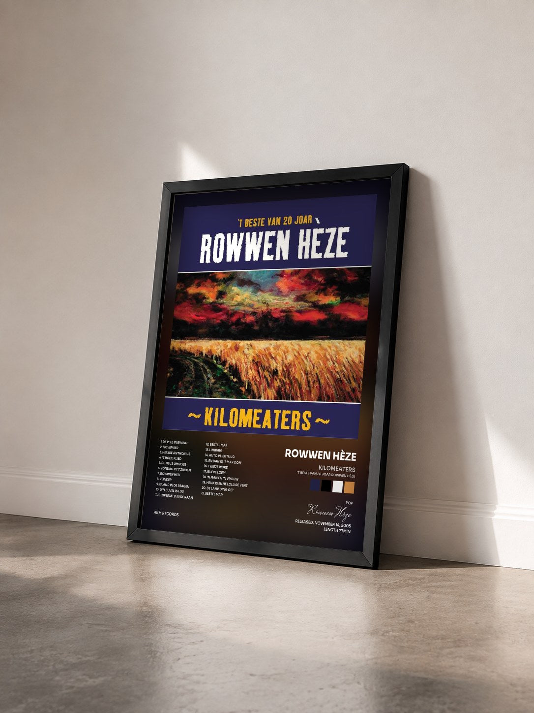#noir Tableau de l'album Kilomeaters ('T Beste Van 20 Joar Rowwen Hèze) de Rowwen Hèze vu de trois quarts, cadre noir