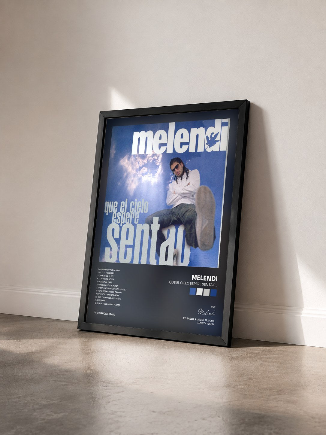 #noir Tableau de l'album Que El Cielo Espere Sentao.. de Melendi vu de trois quarts, cadre noir