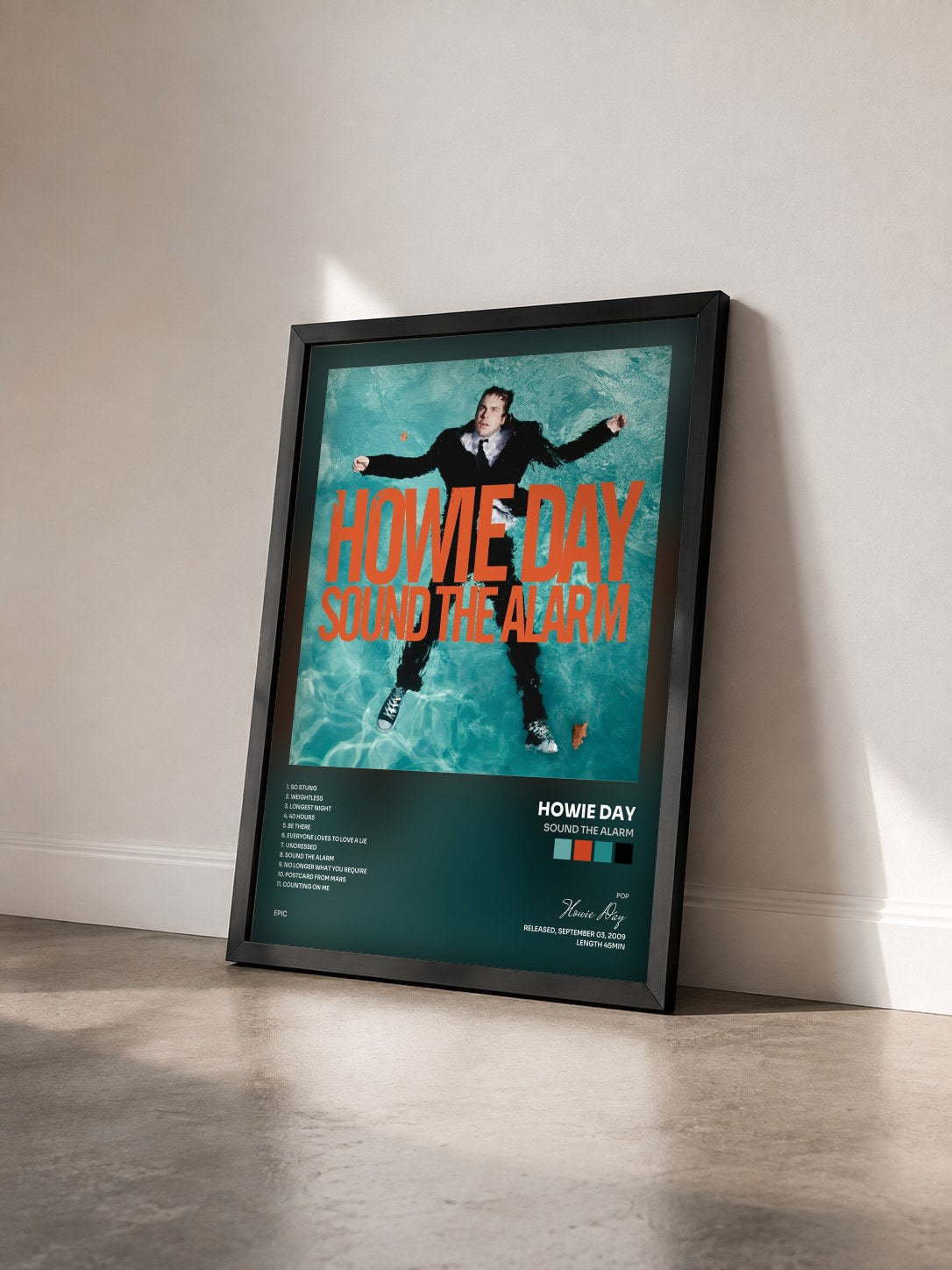 #noir Tableau de l'album Sound The Alarm de Howie Day vu de trois quarts, cadre noir