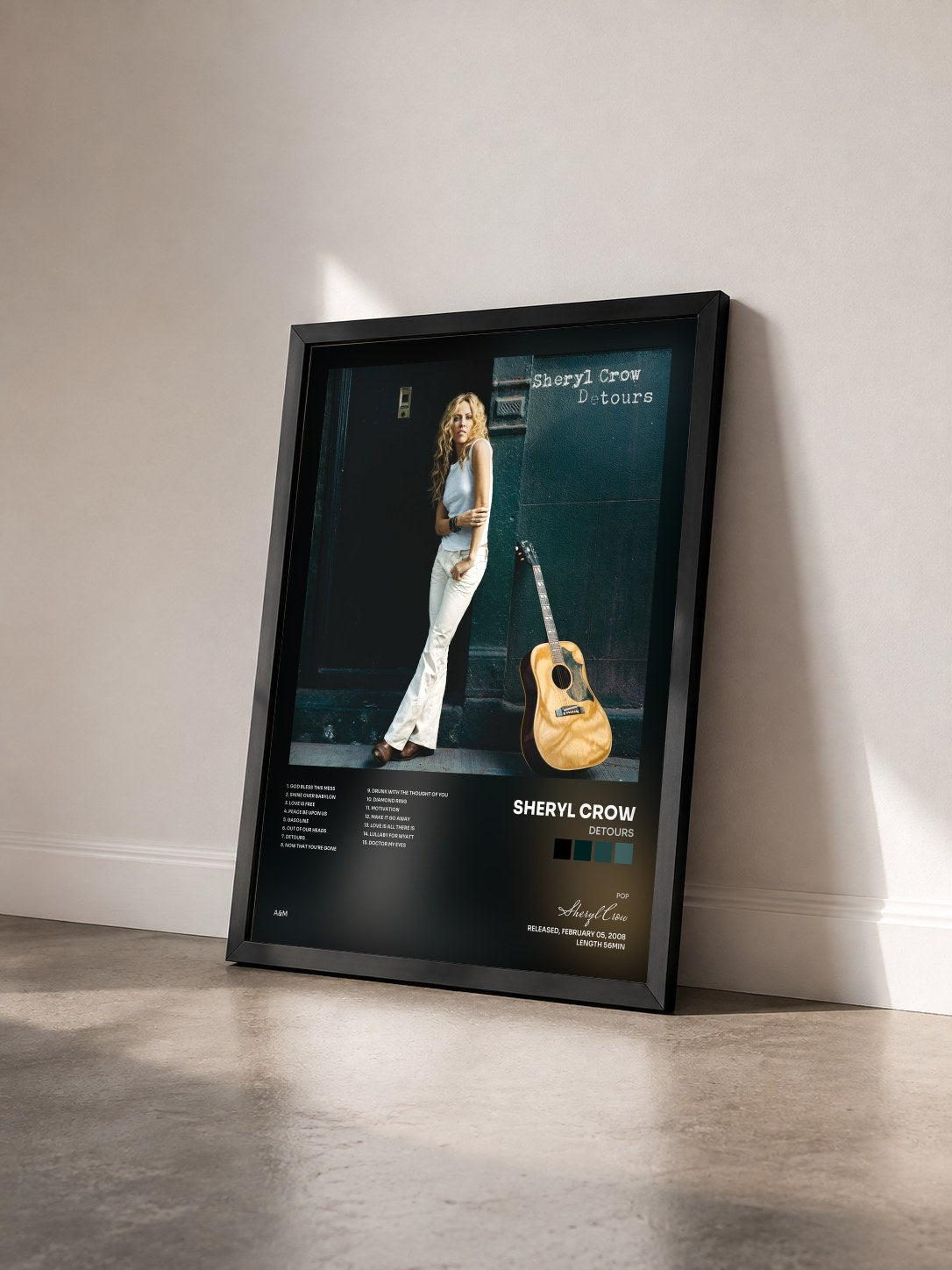 #noir Tableau de l'album Detours de Sheryl Crow vu de trois quarts, cadre noir