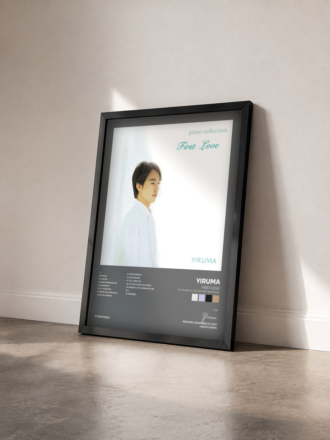 #noir Tableau de l'album First Love (The Original & the Very First Recording) de Yiruma vu de trois quarts, cadre noir