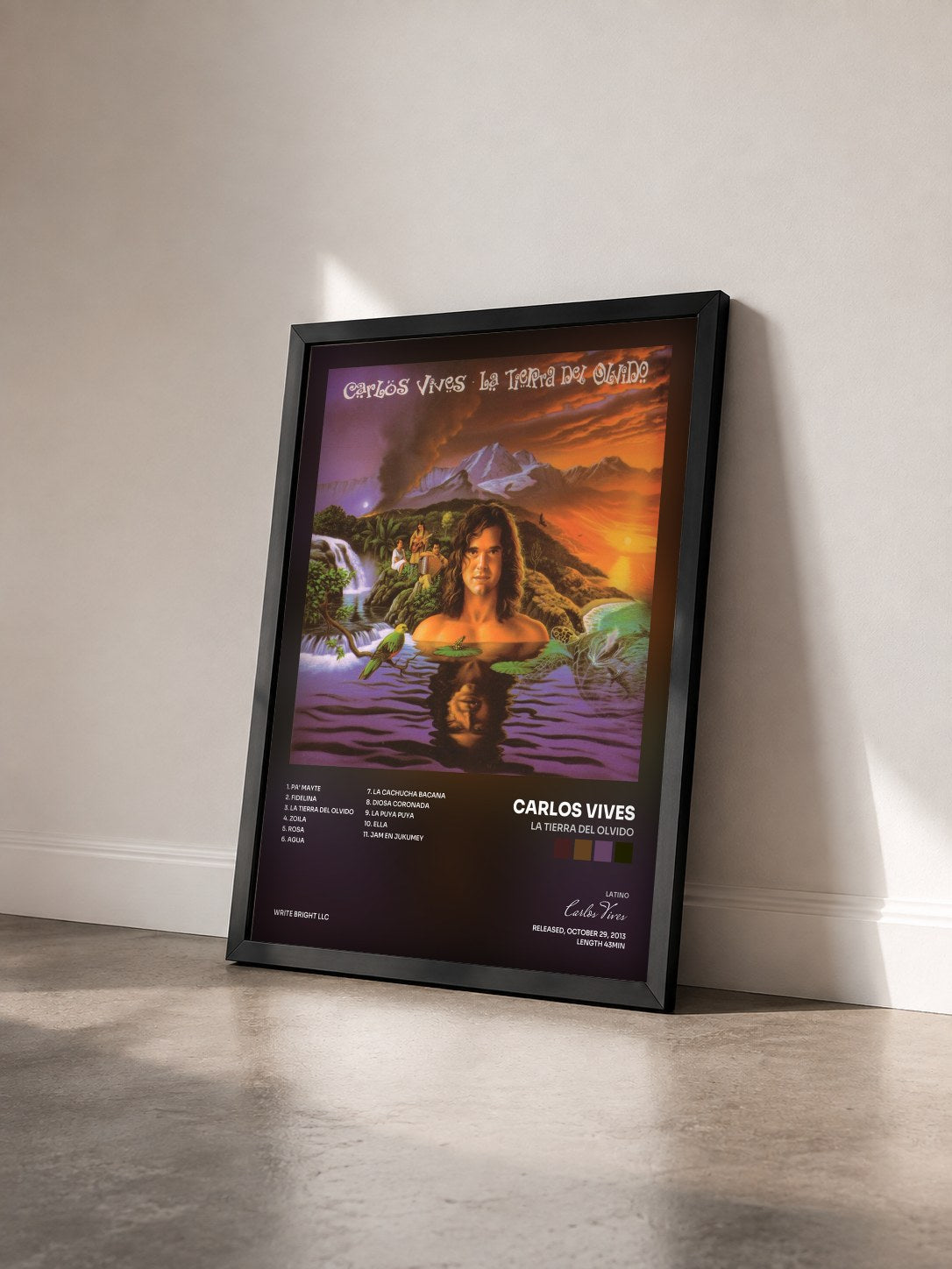#noir Tableau de l'album La Tierra del Olvido de Carlos Vives vu de trois quarts, cadre noir