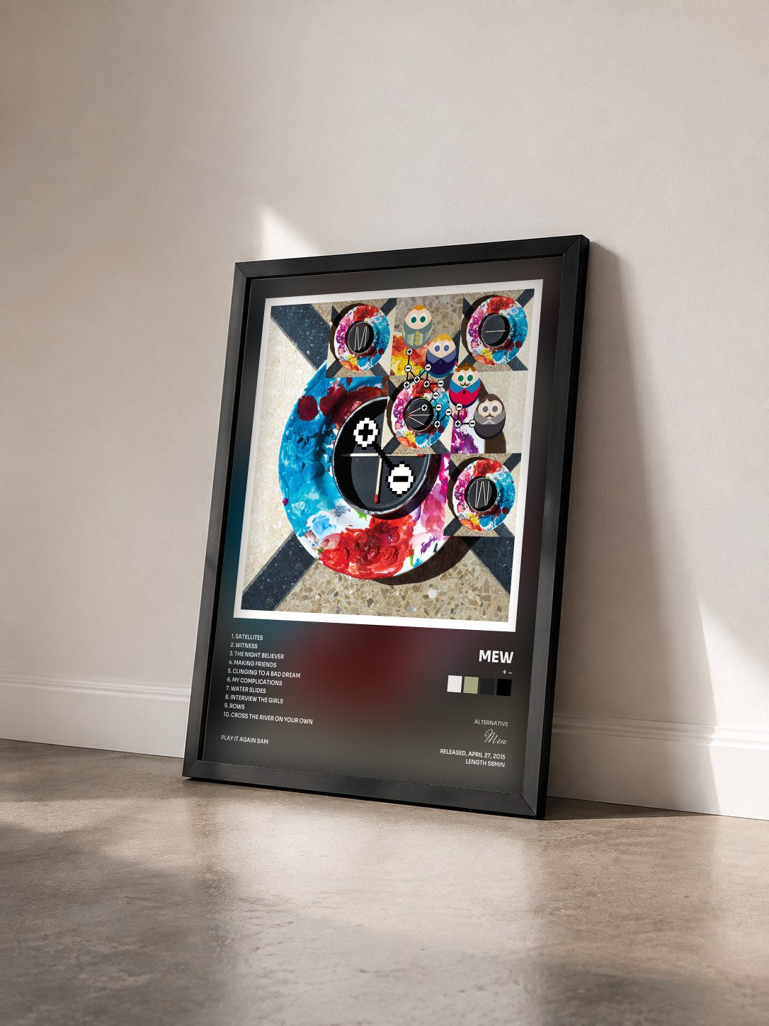 #noir Tableau de l'album + - de Mew vu de trois quarts, cadre noir
