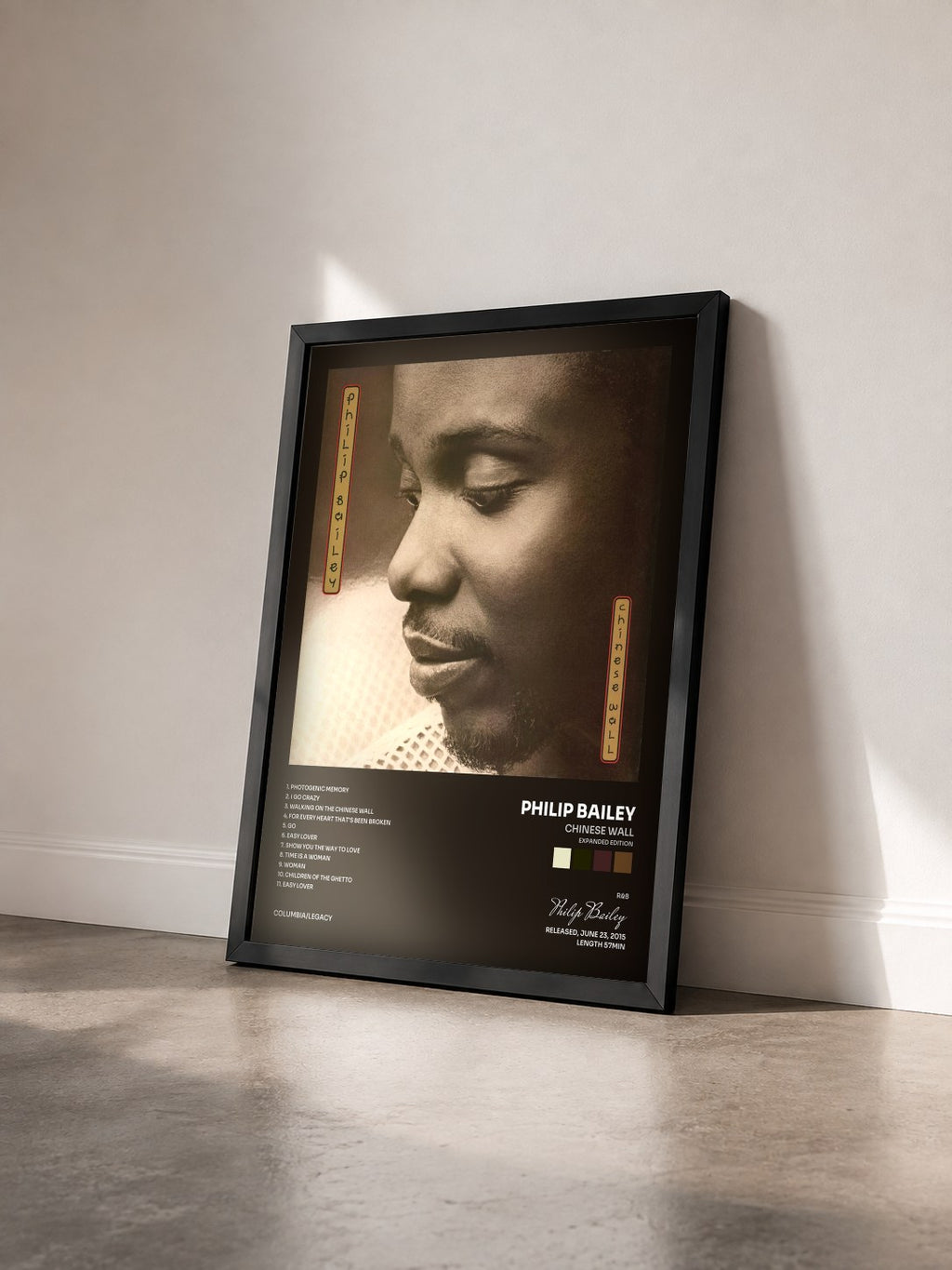 #noir Tableau de l'album Chinese Wall (Expanded Edition) de Philip Bailey vu de trois quarts, cadre noir