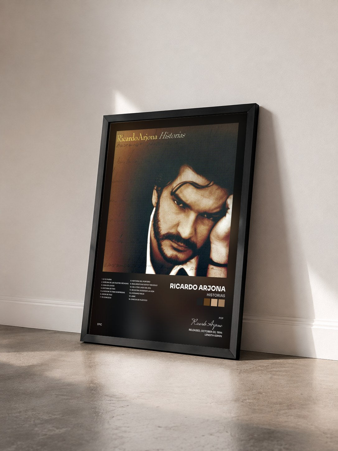 #noir Tableau de l'album Historias de Ricardo Arjona vu de trois quarts, cadre noir