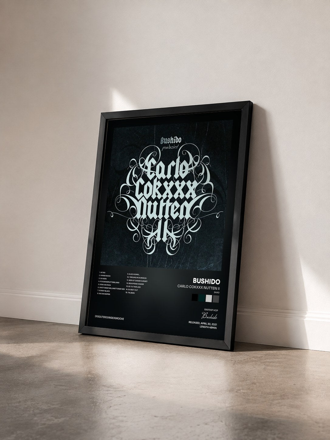 #noir Tableau de l'album Carlo Cokxxx Nutten II (Saad) de Bushido vu de trois quarts, cadre noir
