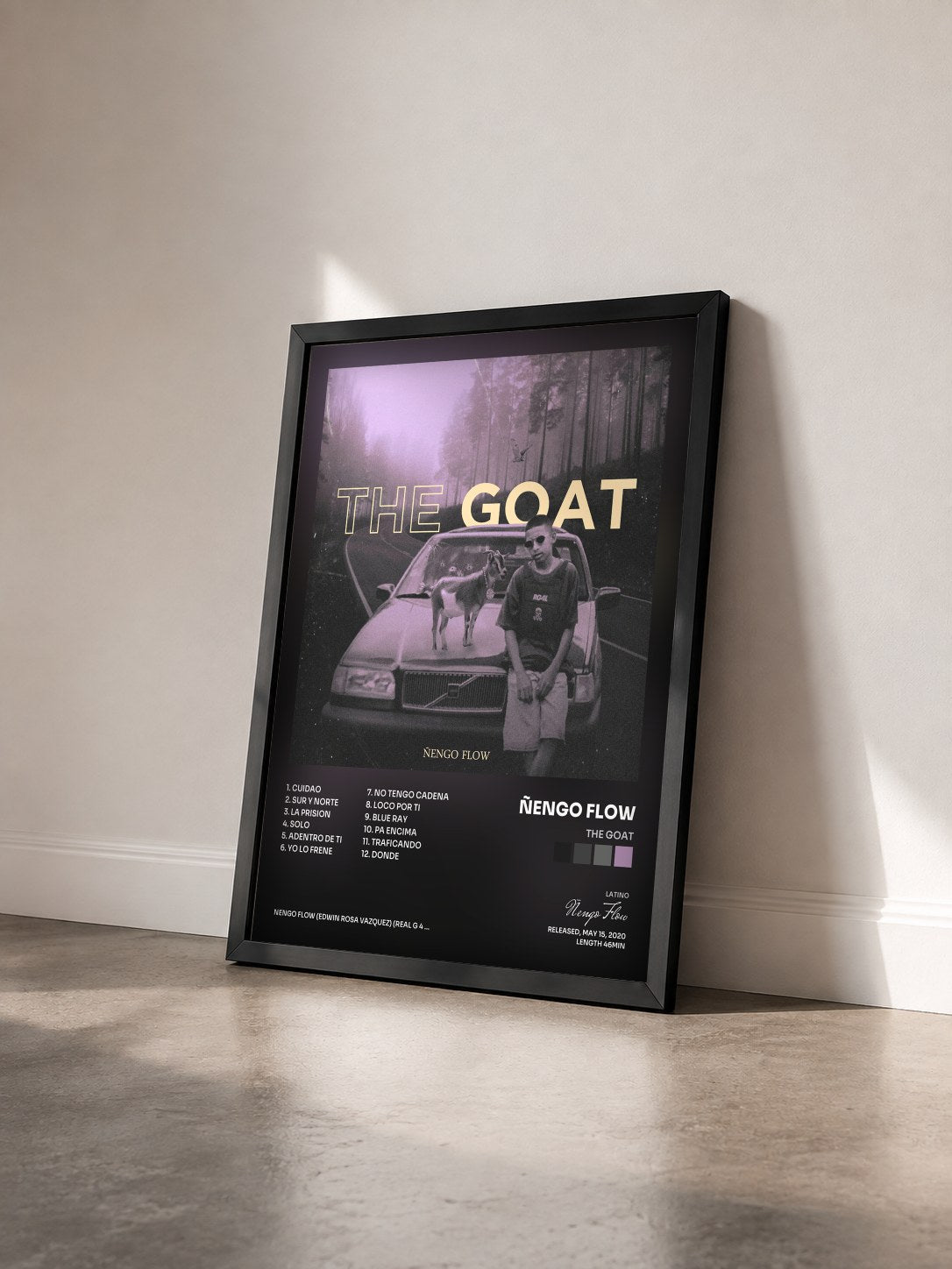 #noir Tableau de l'album The Goat de Ñengo Flow vu de trois quarts, cadre noir