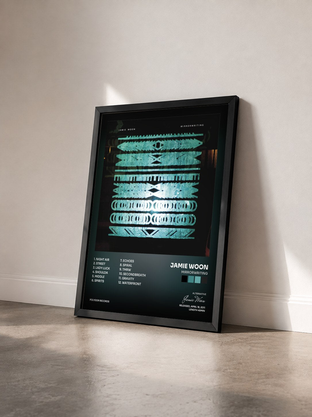 #noir Tableau de l'album Mirrorwriting de Jamie Woon vu de trois quarts, cadre noir