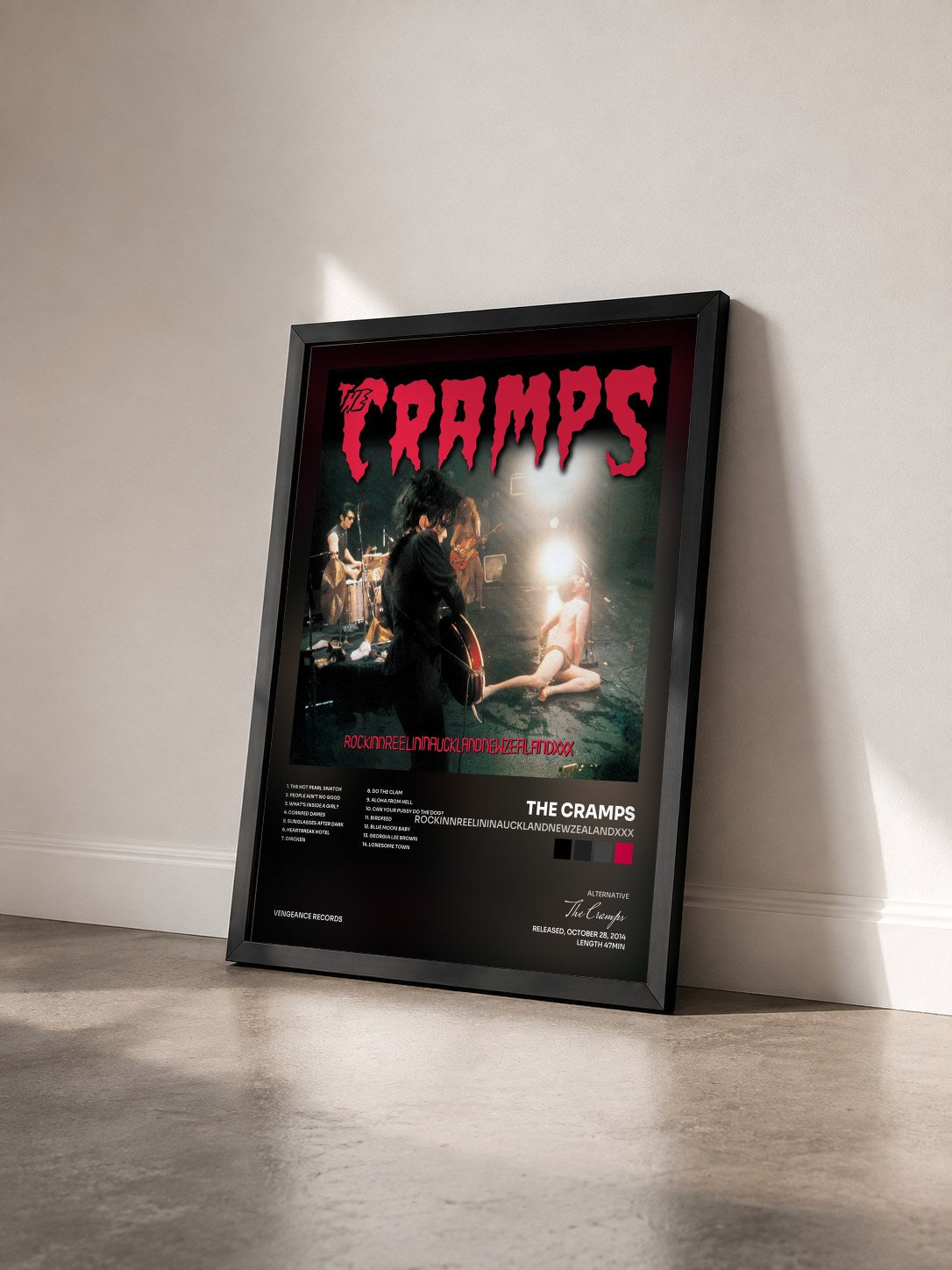 #noir Tableau de l'album Rockinnreelininaucklandnewzealandxxx de The Cramps vu de trois quarts, cadre noir