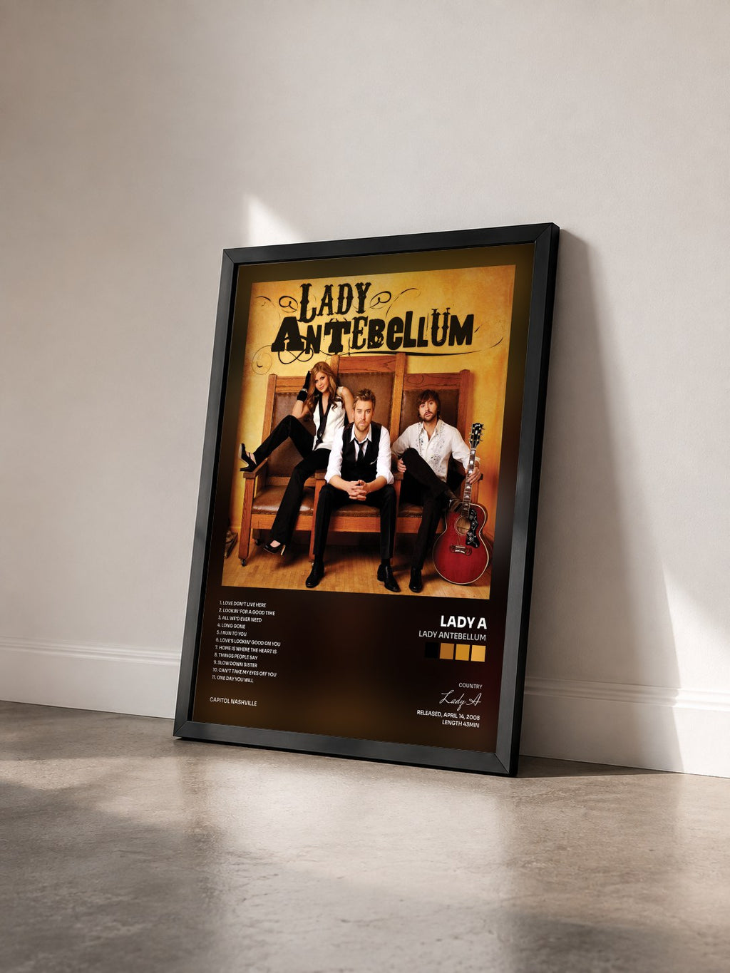 #noir Tableau de l'album Lady Antebellum de Lady A vu de trois quarts, cadre noir