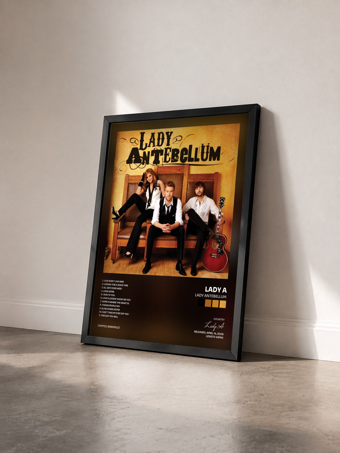 #noir Tableau de l'album Lady Antebellum de Lady A vu de trois quarts, cadre noir