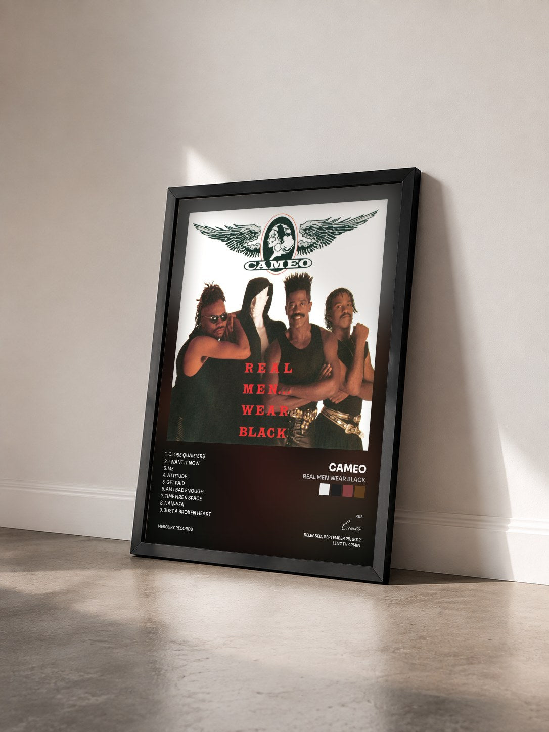 #noir Tableau de l'album Real Men Wear Black de Cameo vu de trois quarts, cadre noir