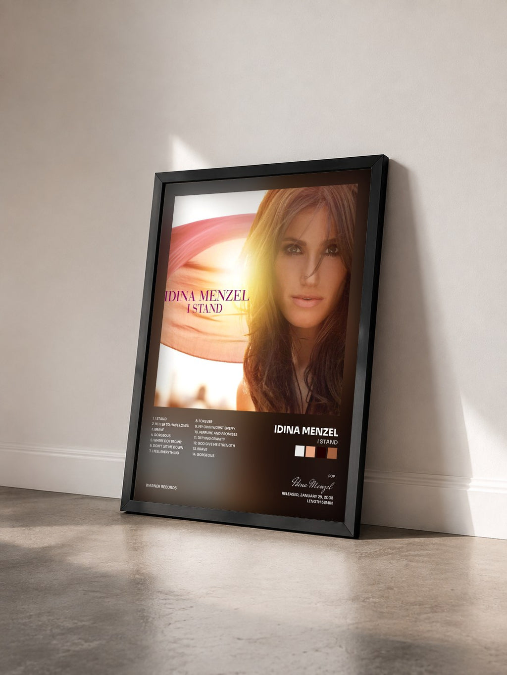 #noir Tableau de l'album I Stand de Idina Menzel vu de trois quarts, cadre noir