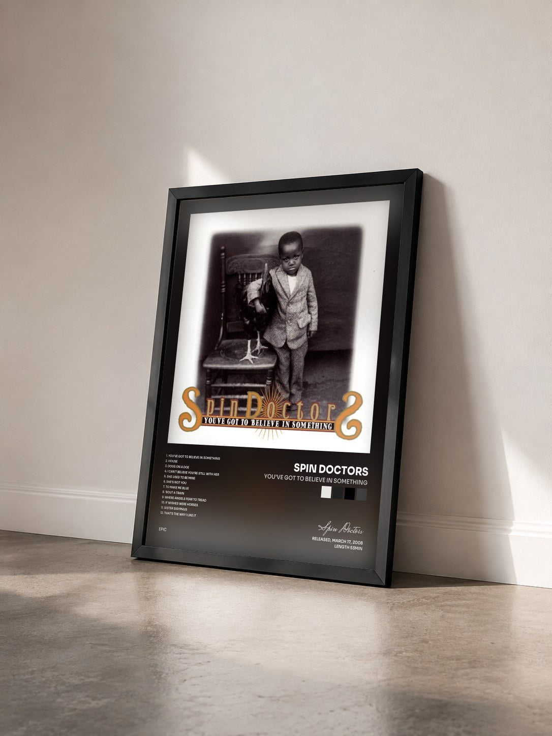 #noir Tableau de l'album You've Got To Believe In Something de Spin Doctors vu de trois quarts, cadre noir