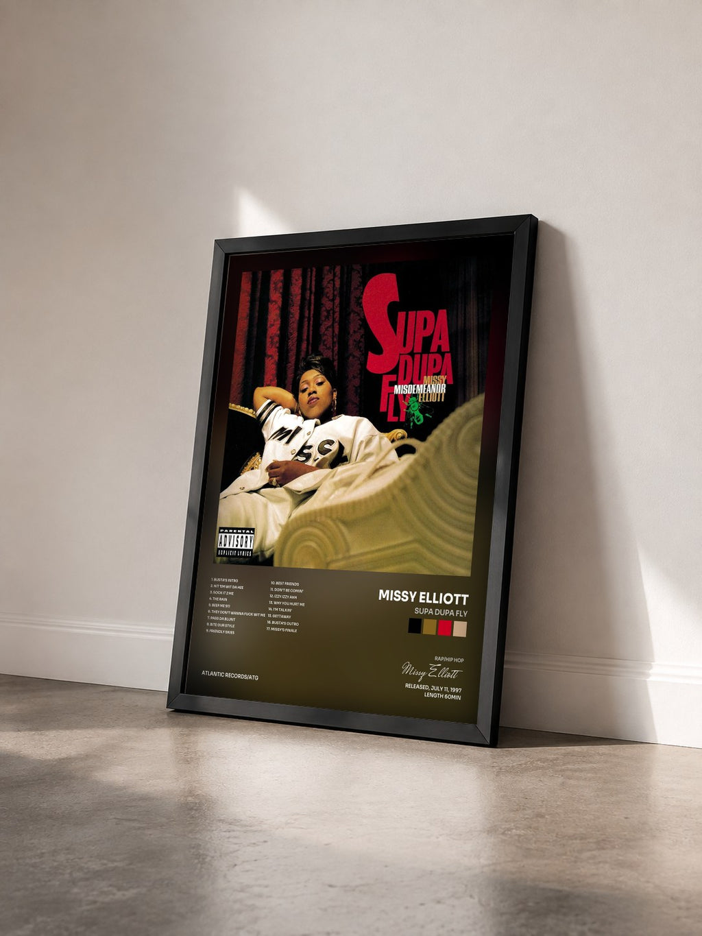 #noir Tableau de l'album Supa Dupa Fly de Missy Elliott vu de trois quarts, cadre noir