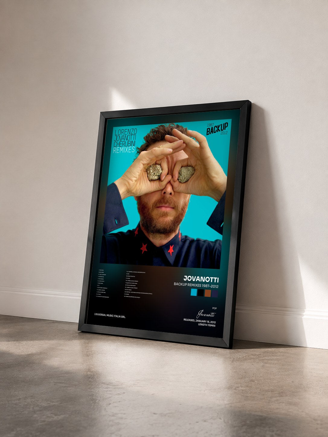 #noir Tableau de l'album Backup Remixes 1987-2012 de Jovanotti vu de trois quarts, cadre noir