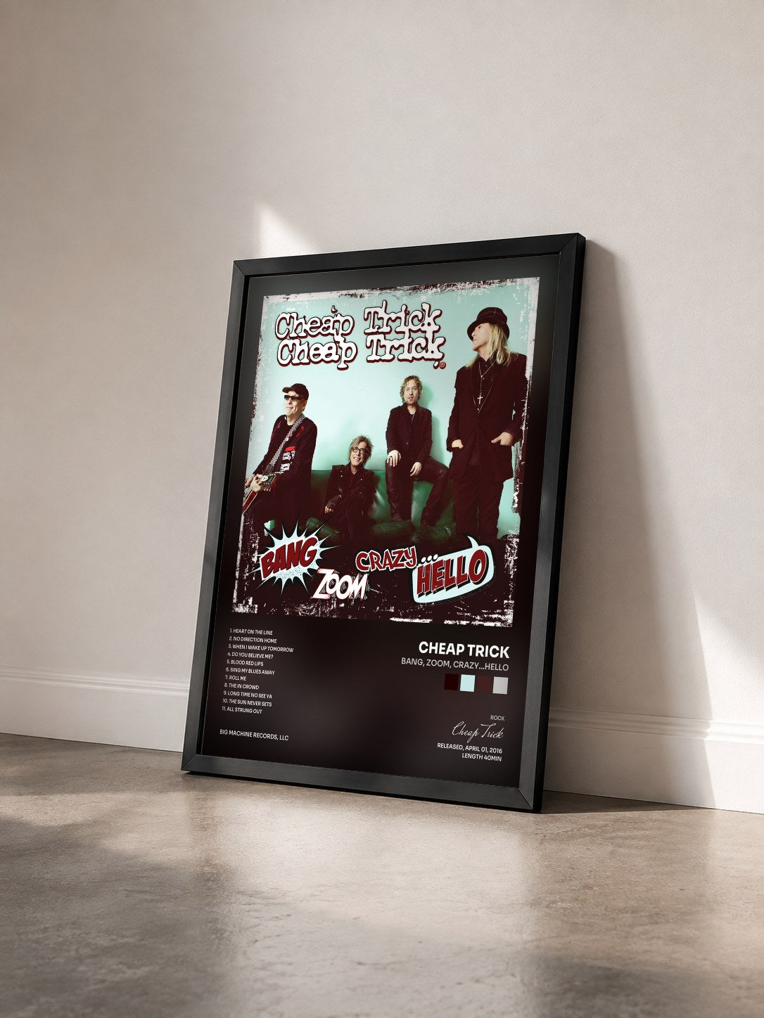 #noir Tableau de l'album Bang, Zoom, Crazy…Hello de Cheap Trick vu de trois quarts, cadre noir