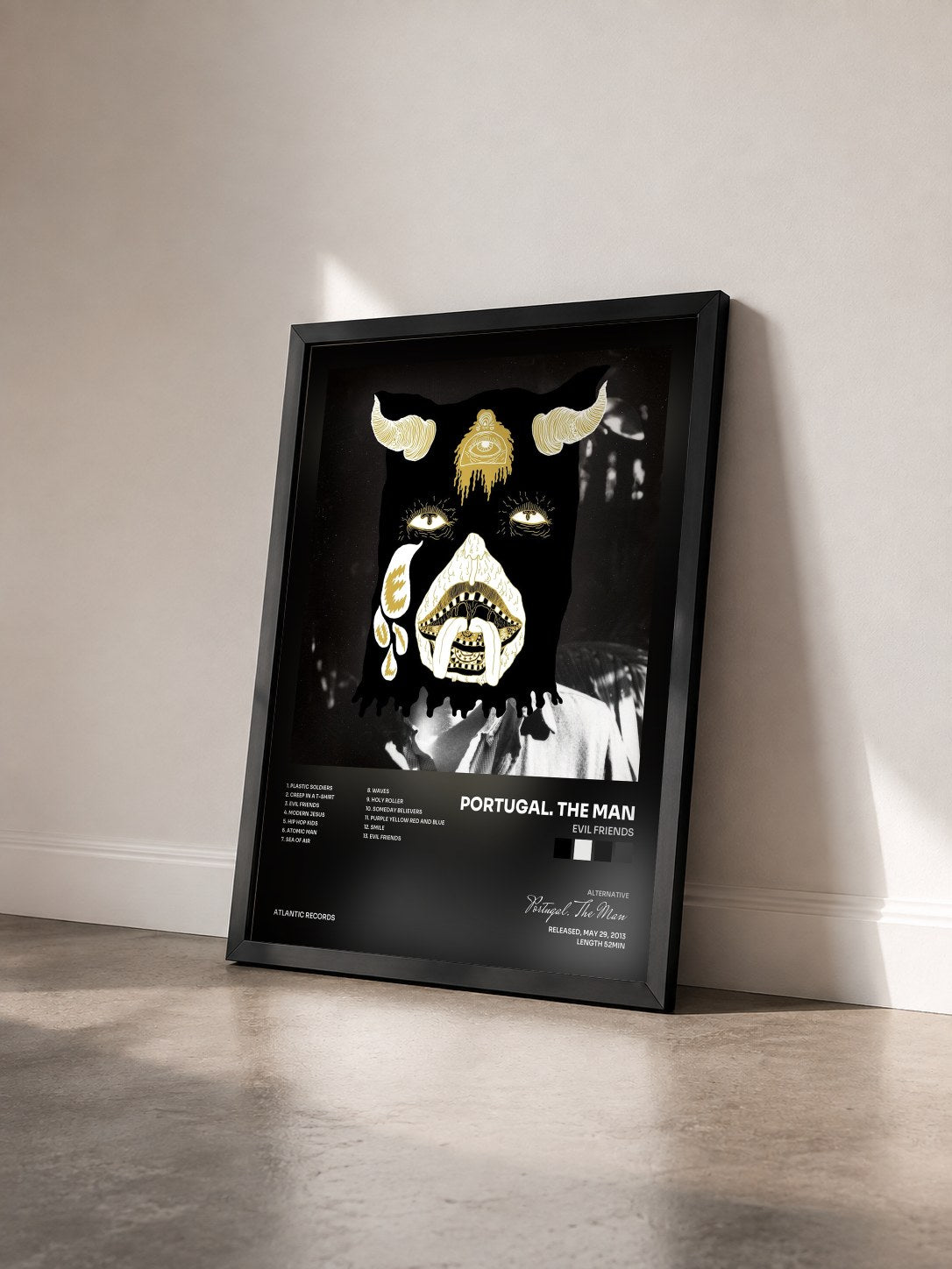 #noir Tableau de l'album Evil Friends de Portugal. The Man vu de trois quarts, cadre noir