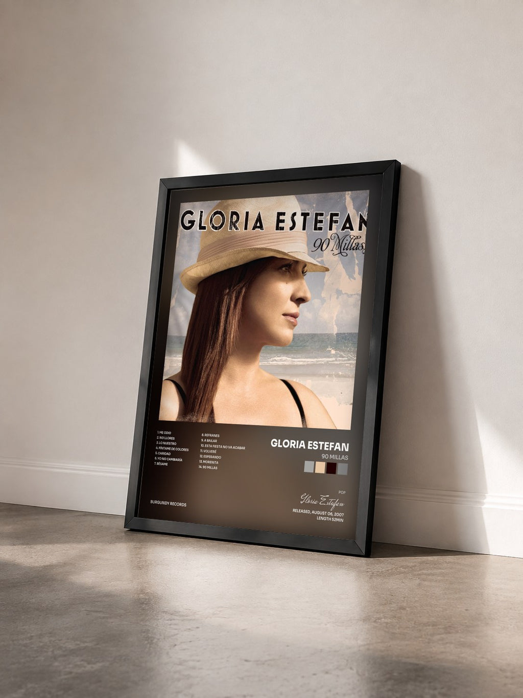#noir Tableau de l'album 90 Millas de Gloria Estefan vu de trois quarts, cadre noir
