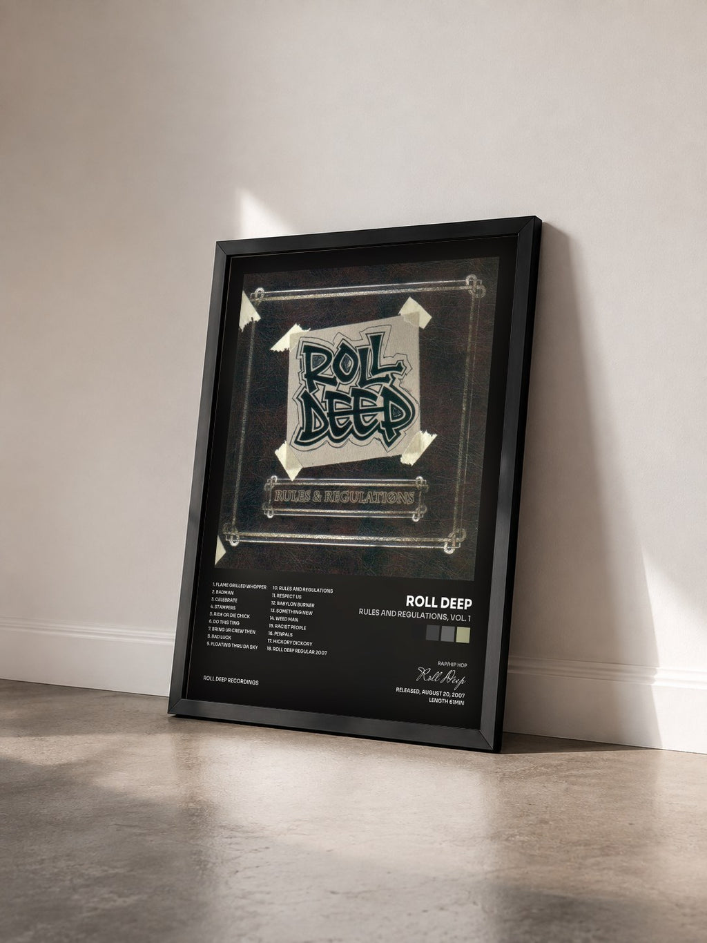 #noir Tableau de l'album Rules and Regulations, Vol. 1 de Roll Deep vu de trois quarts, cadre noir
