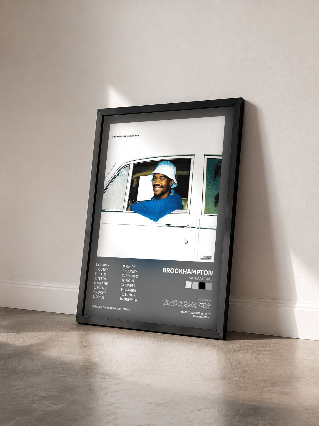 #noir Tableau de l'album SATURATION II de BROCKHAMPTON vu de trois quarts, cadre noir