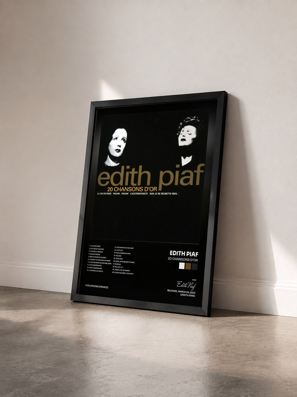 #noir Tableau de l'album 20 chansons d'or de Edith Piaf vu de trois quarts, cadre noir