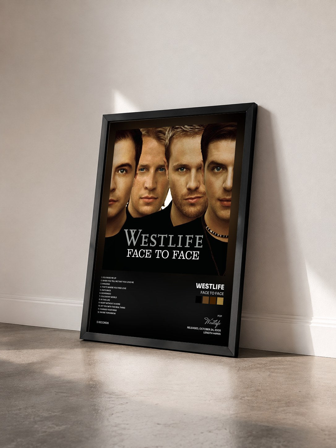 #noir Tableau de l'album Face To Face de Westlife vu de trois quarts, cadre noir