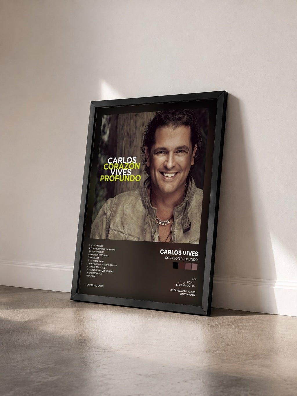 #noir Tableau de l'album Corazón Profundo de Carlos Vives vu de trois quarts, cadre noir