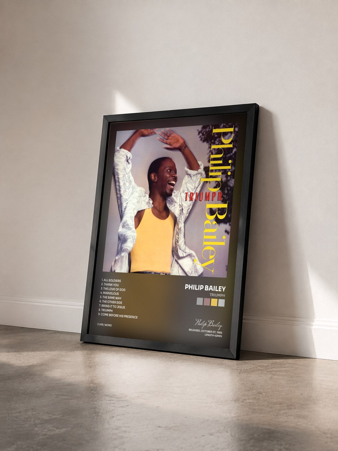 #noir Tableau de l'album Triumph de Philip Bailey vu de trois quarts, cadre noir