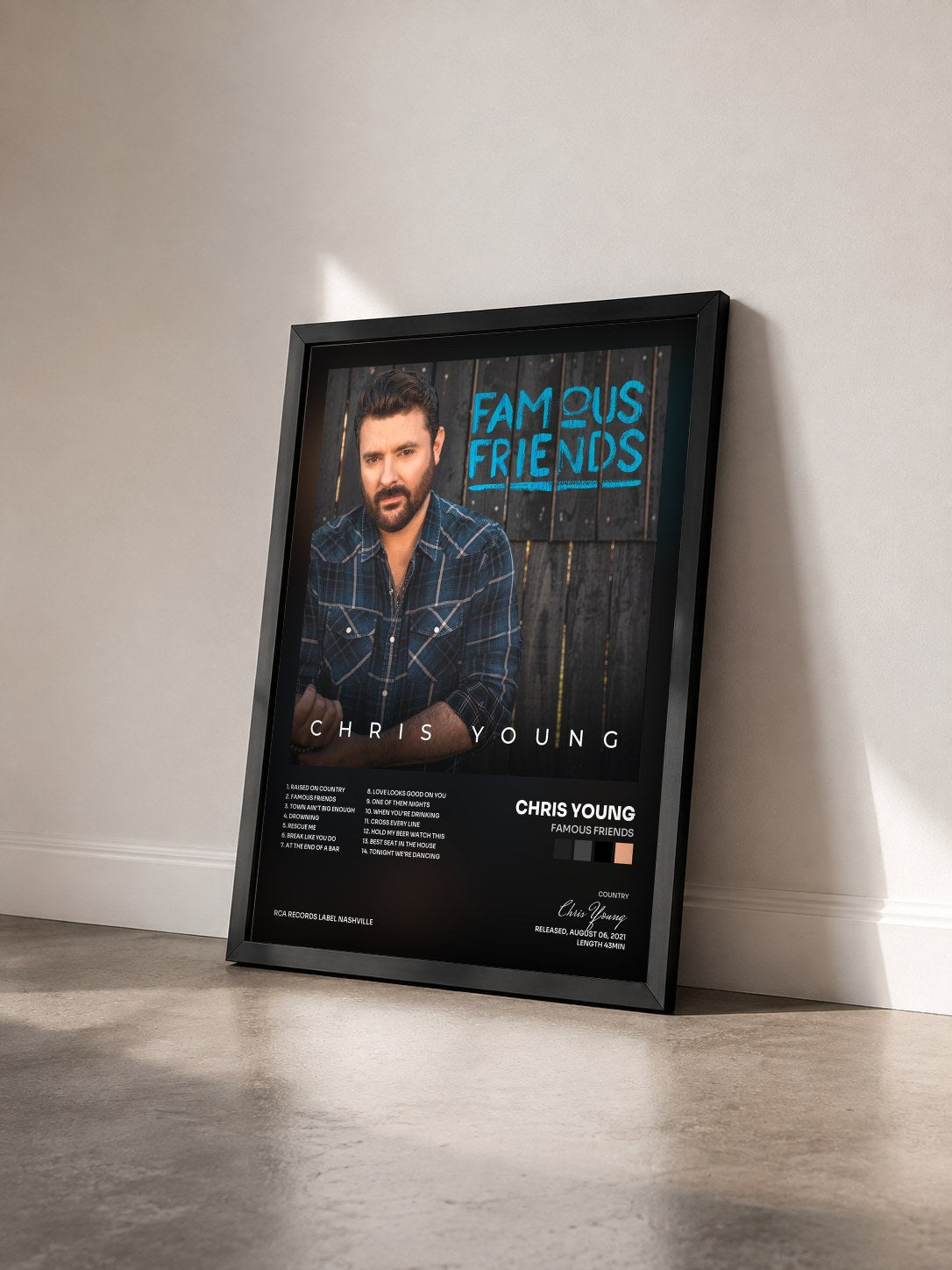 #noir Tableau de l'album Famous Friends de Chris Young vu de trois quarts, cadre noir