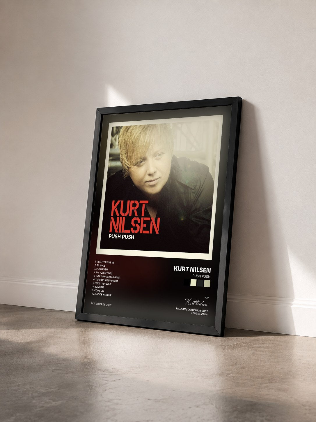 #noir Tableau de l'album Push Push de Kurt Nilsen vu de trois quarts, cadre noir