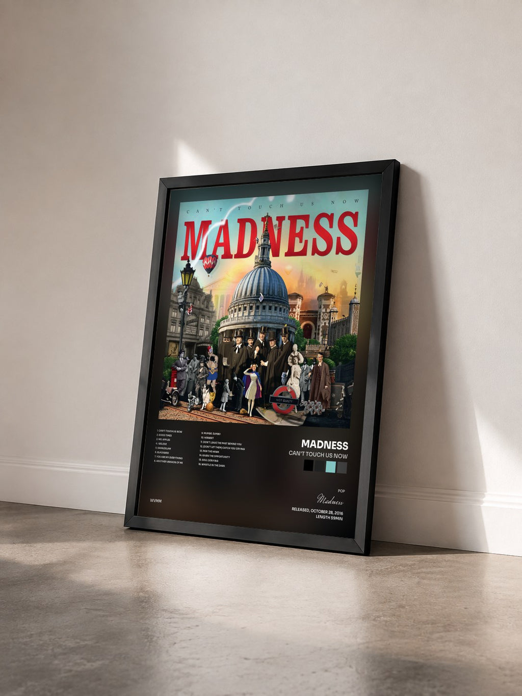 #noir Tableau de l'album Can't Touch Us Now de Madness vu de trois quarts, cadre noir