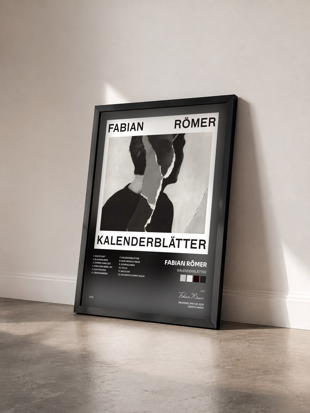 #noir Tableau de l'album Kalenderblätter de Fabian Römer vu de trois quarts, cadre noir