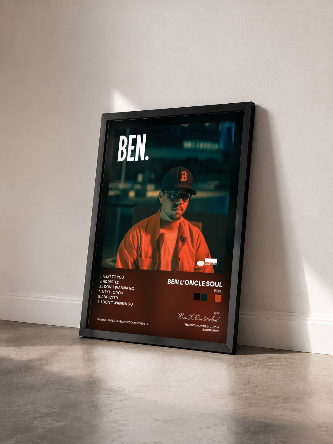 #noir Tableau de l'album Ben. de Ben L'Oncle Soul vu de trois quarts, cadre noir