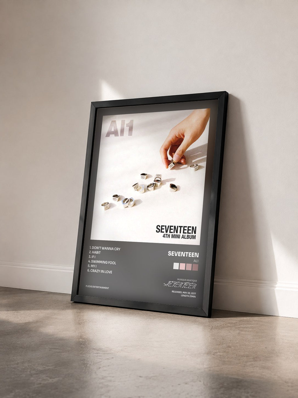 #noir Tableau de l'album Al1 de SEVENTEEN vu de trois quarts, cadre noir