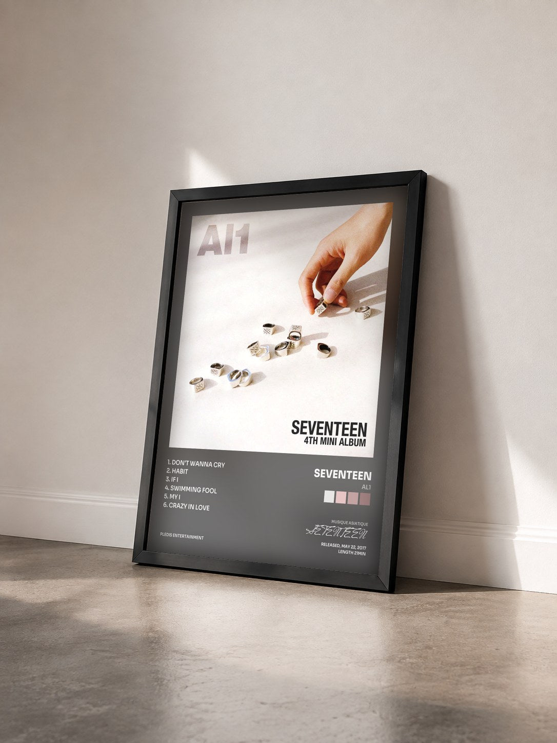 #noir Tableau de l'album Al1 de SEVENTEEN vu de trois quarts, cadre noir