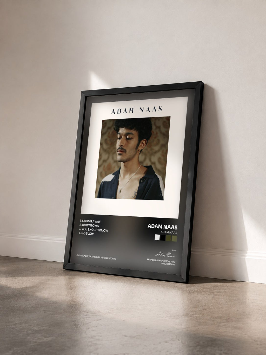 #noir Tableau de l'album Adam Naas de Adam Naas vu de trois quarts, cadre noir