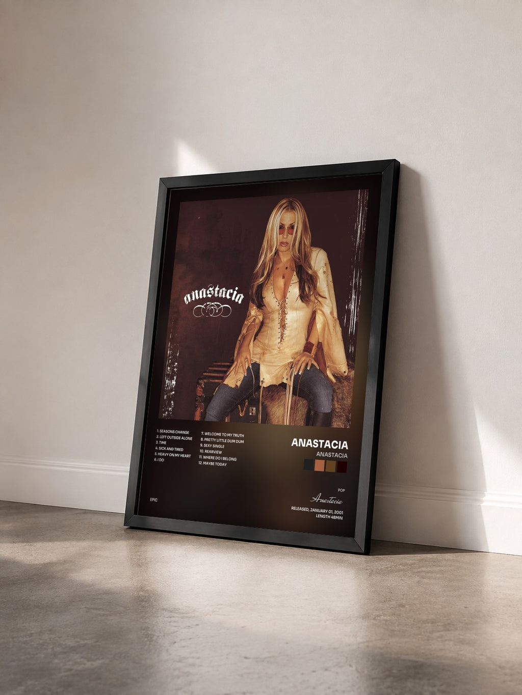 #noir Tableau de l'album Anastacia de Anastacia vu de trois quarts, cadre noir