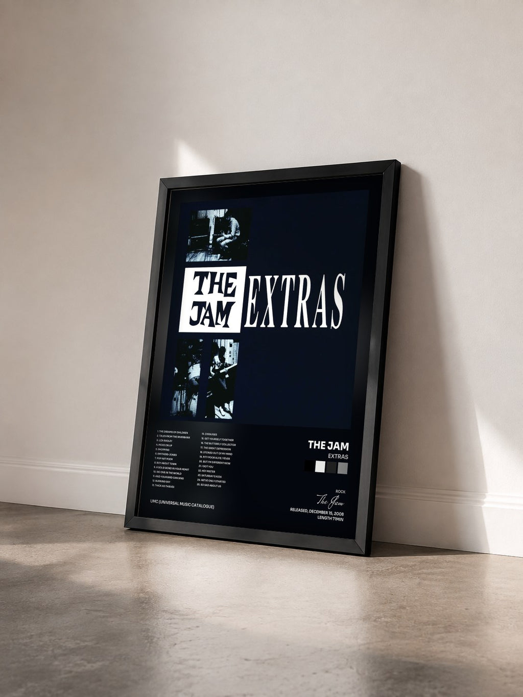 #noir Tableau de l'album Extras de The Jam vu de trois quarts, cadre noir