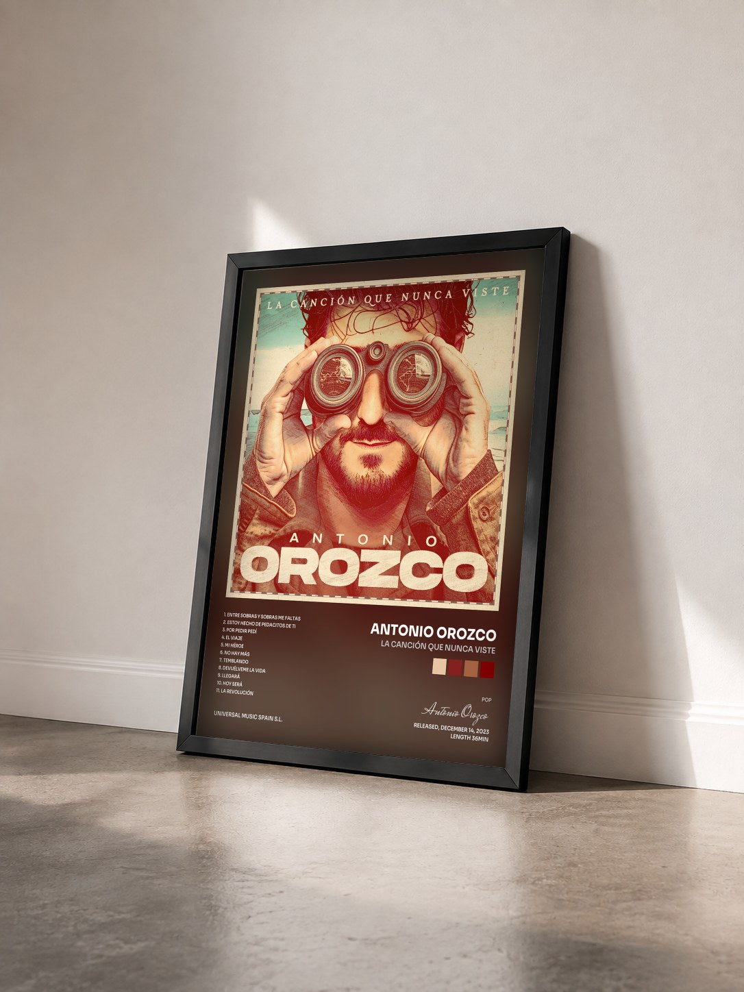 #noir Tableau de l'album La Canción Que Nunca Viste de Antonio Orozco vu de trois quarts, cadre noir