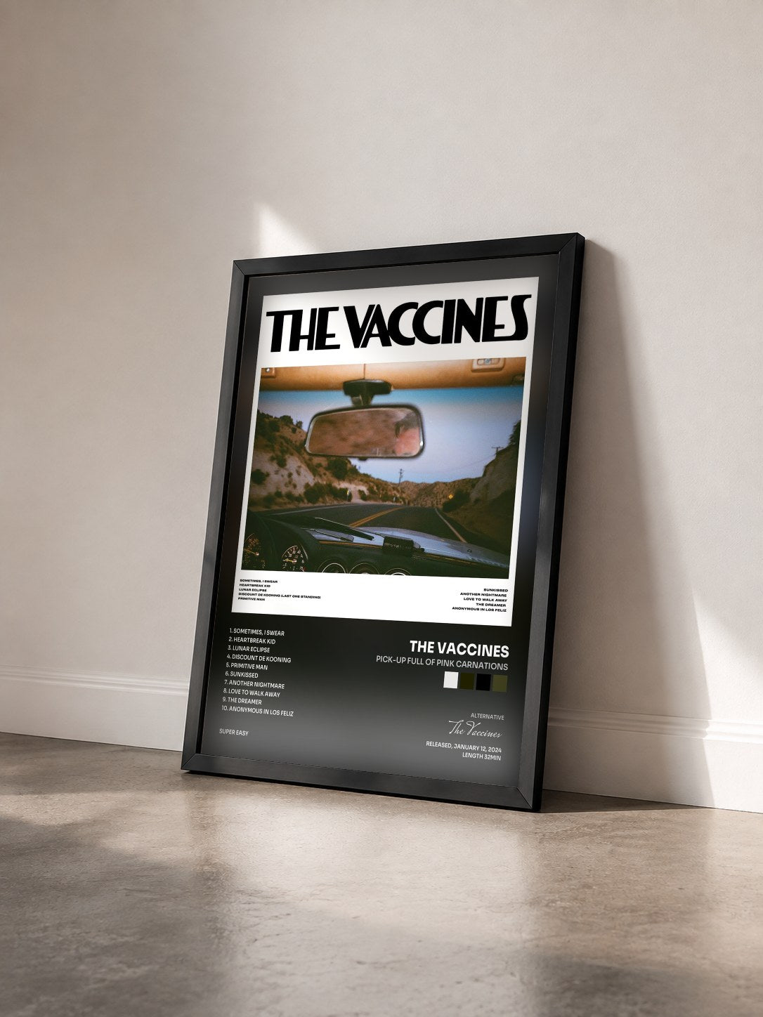 #noir Tableau de l'album Pick-Up Full Of Pink Carnations de The Vaccines vu de trois quarts, cadre noir