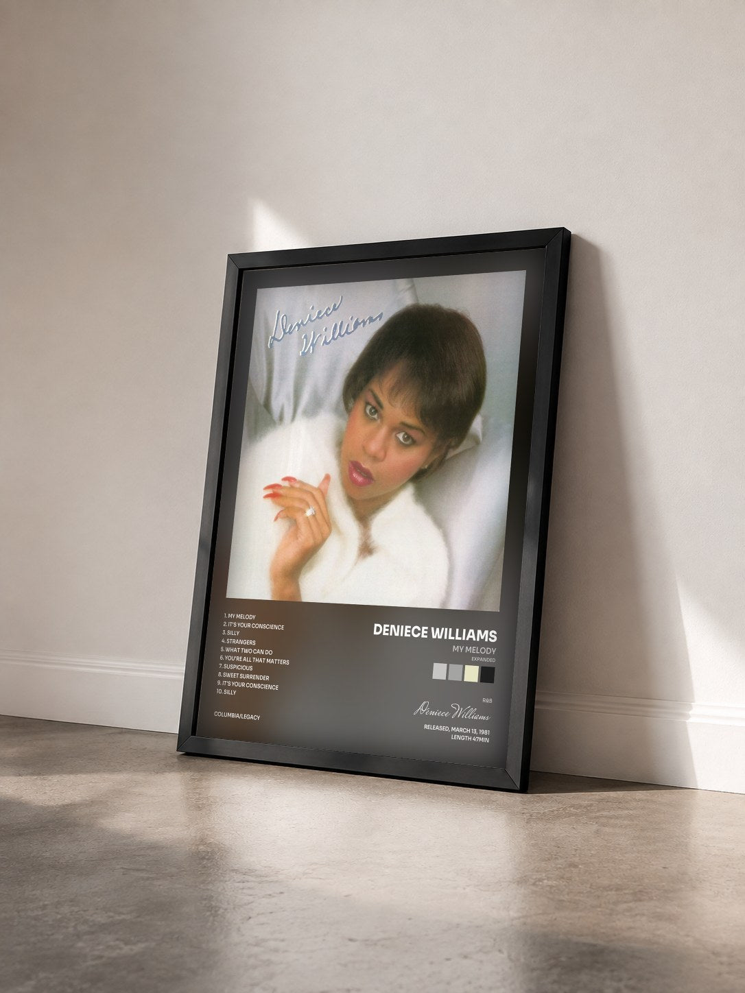 #noir Tableau de l'album My Melody (Expanded) de Deniece Williams vu de trois quarts, cadre noir