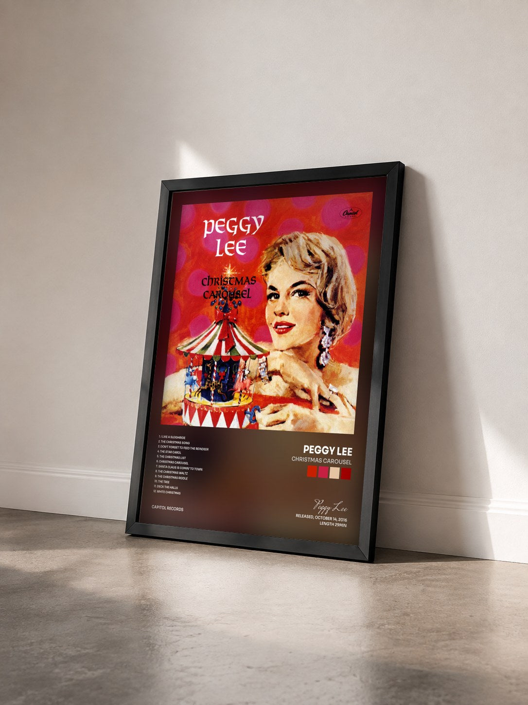 #noir Tableau de l'album Christmas Carousel de Peggy Lee vu de trois quarts, cadre noir