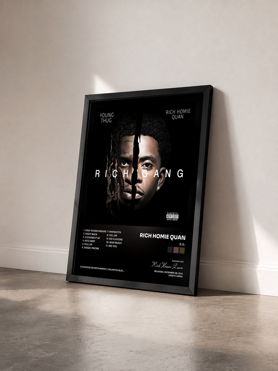 #noir Tableau de l'album R.G. de Rich Homie Quan vu de trois quarts, cadre noir