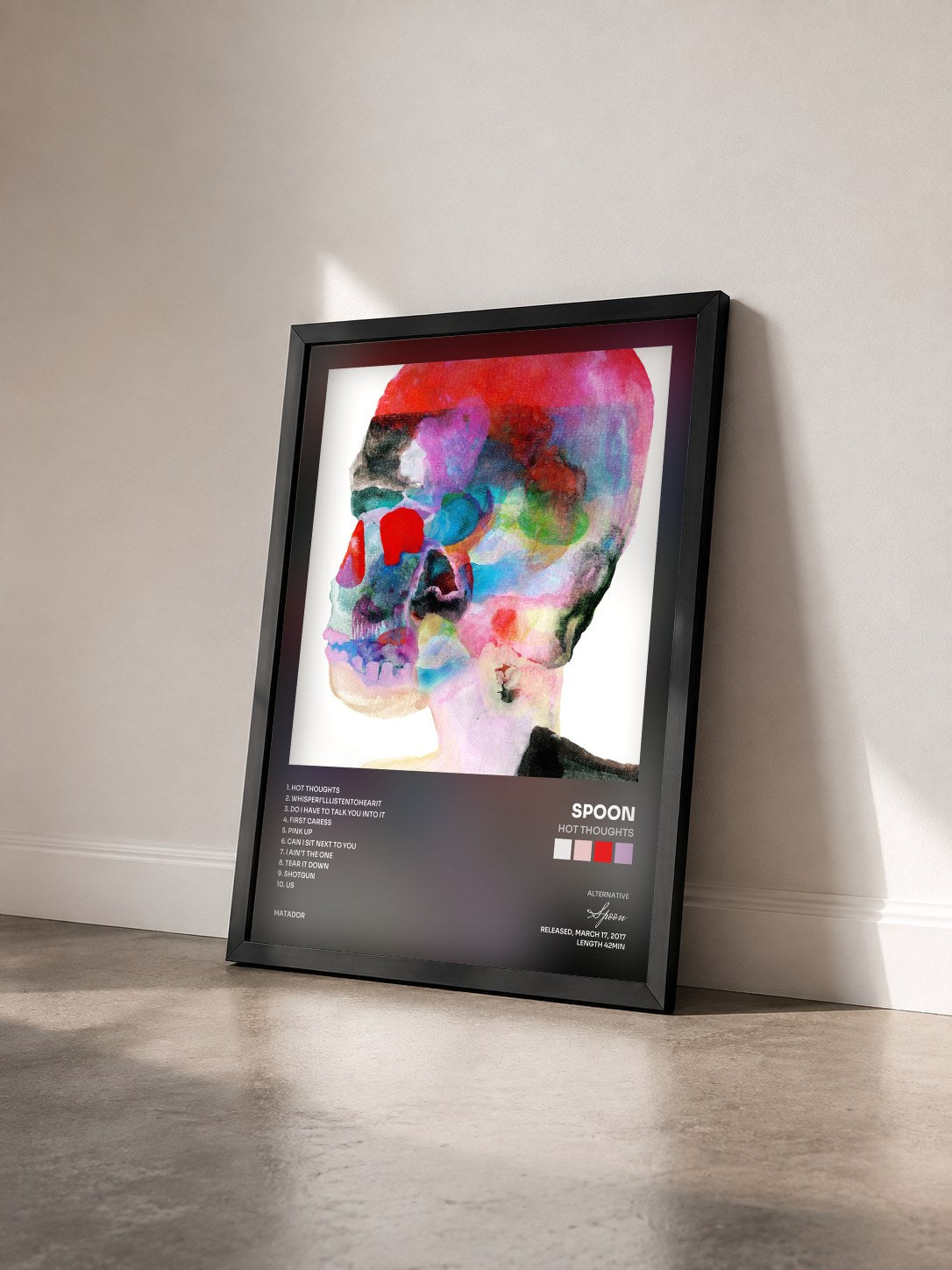 #noir Tableau de l'album Hot Thoughts de Spoon vu de trois quarts, cadre noir